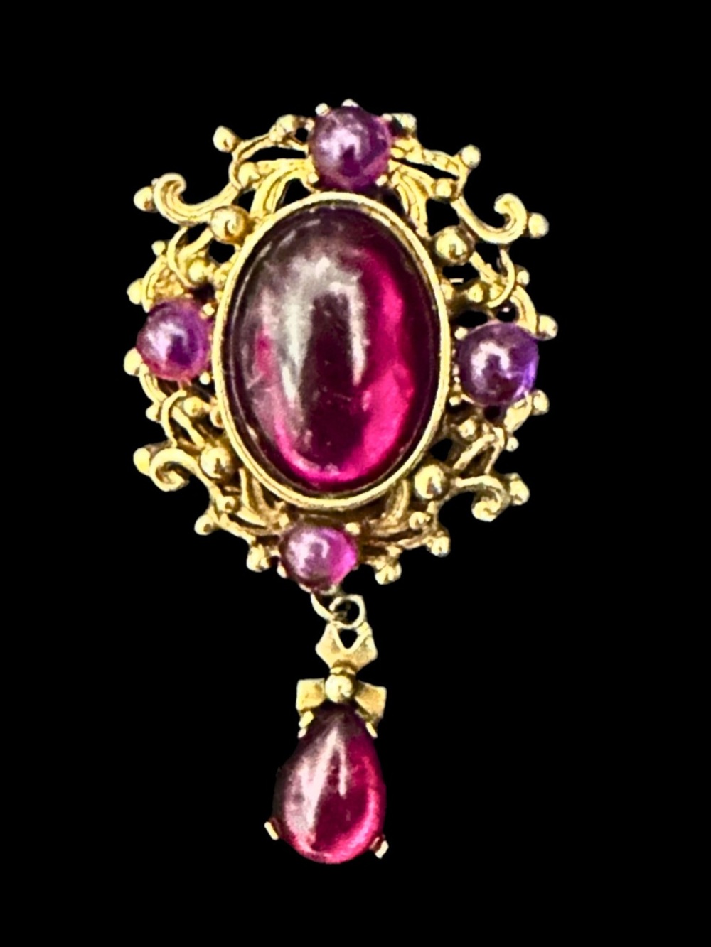 Vintage-Inspired Gold Brooch with Deep Magenta Gemstones